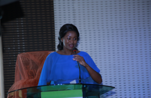 Esther Wahome HSC, giving her speech- reading her foreword